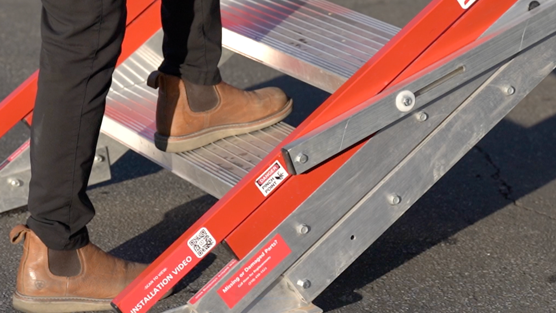 Person leveling treads on the adjustastairs